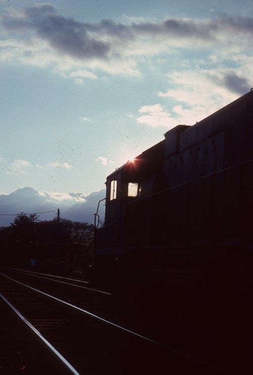   evening photo of B&M #200 at Tyter interlocking, Athol, MA