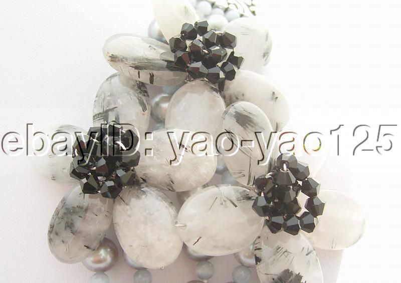   oval cloudy quartz, black rhombus crystal, good quality, high luster