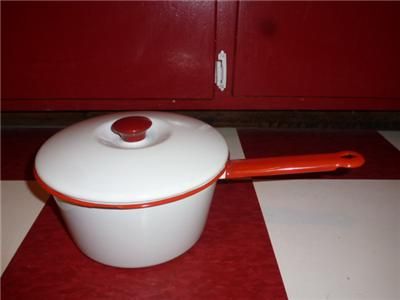 These enamelware pots and pans are in very good vintage condition.