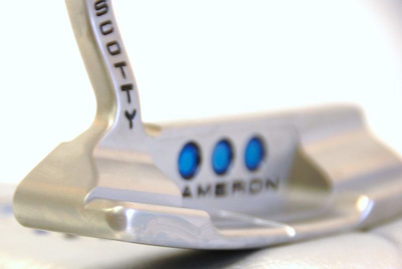 Customized Putter, Weights, Grip and Headcover.