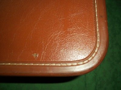 UP FOR AUCTION FROM RECENT SALE IS THIS TAPERLITE FAUX LEATHER 